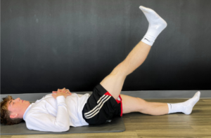 man doing Straight leg raises